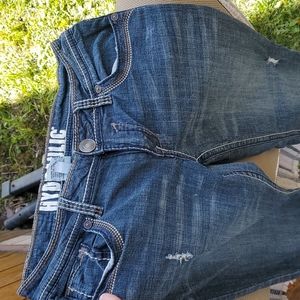 Hydraulic button flap jeans size 7/8.